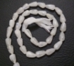 Picture of Rainbow Moonstone top drilled drop beads